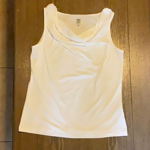 White sleeveless top.